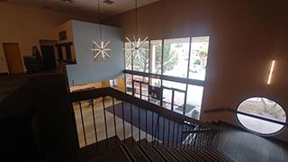 An image of the main stairwell at the entrance of Macey Center.